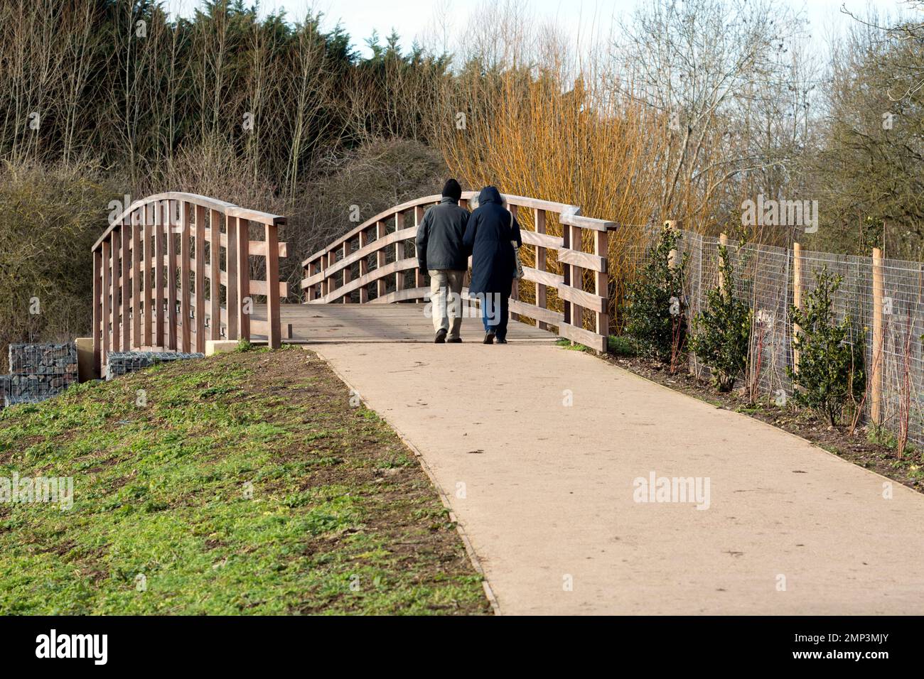 A couple walking on the footpath between the Fisherman`s Car Park and the town centre, Stratford-upon-Avon, UK Stock Photo